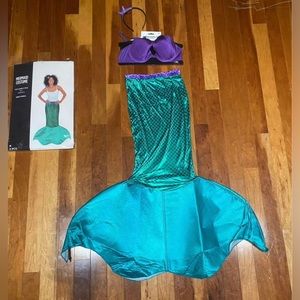 Adult Little Mermaid Halloween Costume. Fin is adult S. Seashell bra is adult L.